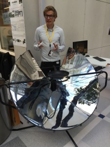One Earth Designs' Chief Marketing Officer Even Haug Larsen shows off its solar kitchen.  Photo by Susan Lahey 