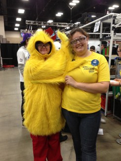 Lauralee Kalinec with the Screaming Chicken mascot for her robotics team.