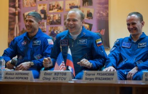 Astronaut Mike Hopkins of NASA, a flight engineer, Cosmonaut Oleg Kotov, Soyuz Commander and Cosmonaut Sergey Ryanzanskiy, Flight Engineer with the Russian Federal Space Agency. Photo courtesy of NASA