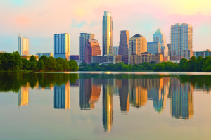 Austin skyline at golden suntrise reflected in Ladybird Lake, photo licensed from iPhoto
