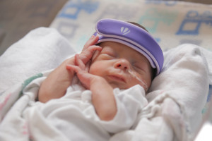 Newborn at Baylor Medical wearing one of Invictus Medical's GELShield devices, courtesy photo