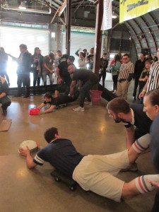 Teams playing human powered Hungry-Hungry Hippos, the mystery event 